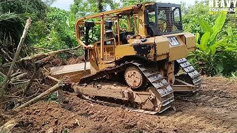 Extraordinary Work, Caterpillar D6R XL Bulldozer Operator Works Clearing Roads on Plantation
