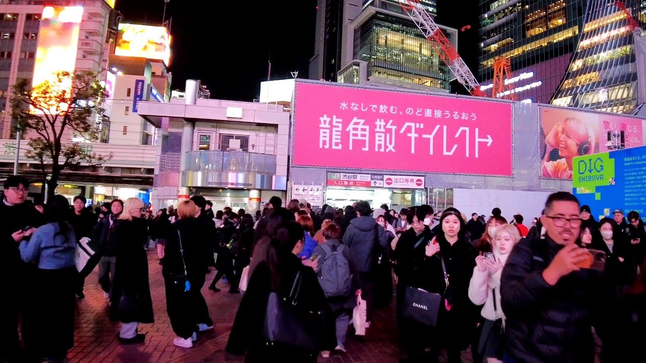 Night walking tour in Shibuya city. Tokyo, Japan. 