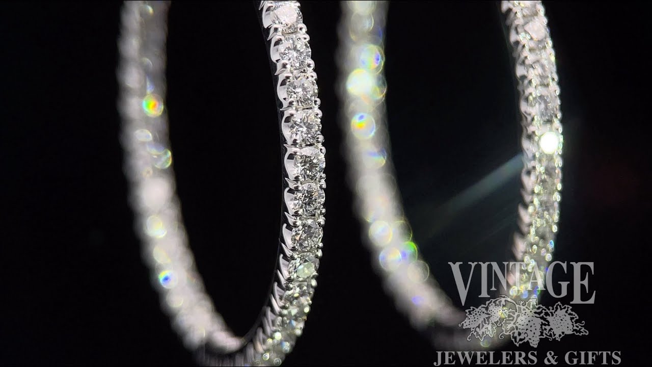 Hand fabricating “inside out” 14k white gold diamond hoop earrings