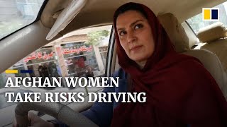 Afghan women take risks driving in Herat after the Taliban restricts new licences