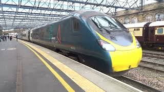 The Class 390 'Pendolino' Avanti West Coast No.390123 leaves at Carlisle. (FT. 'NORTHERN BELLE')