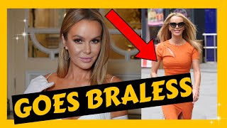 Amanda Holden goes braless in skintight orange dress as she soaks up the sun in London