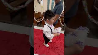 Ring bearer walking down the aisle #happybaby