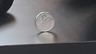 fazendo a moeda CAIR EM PÉ