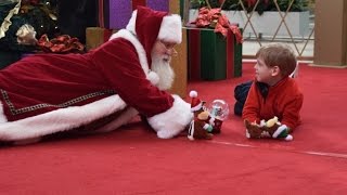 Santa Lies on Floor for Boy With Autism for Perfect Christmas Photo