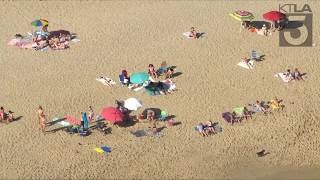 Update: crowds were gathering at some beaches in orange county amid a
heat wave during the covid-19 pandemic. sky5 was overhead. story:
https://ktla.com/news...