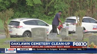 Another cleanup day at Oaklawn Cemetery