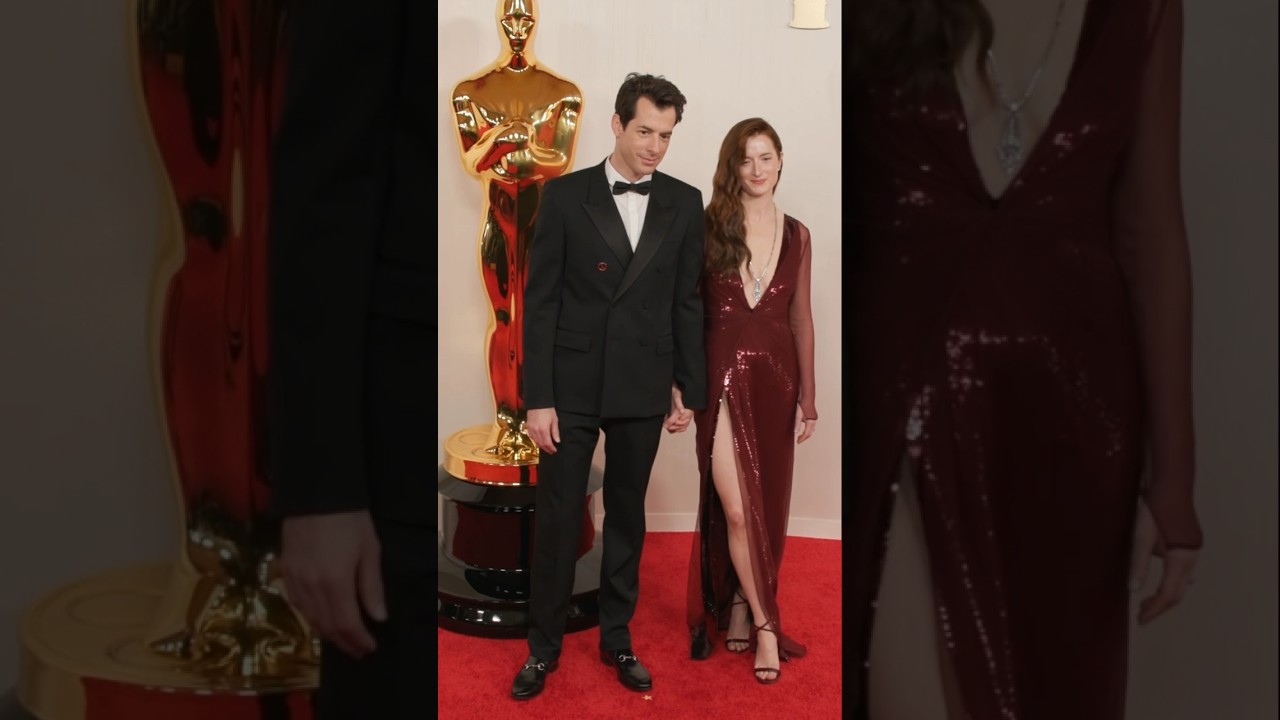 Hand in hand at the #Oscars #MarkRonson #GraceGummer #Gucci