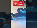 Comparing two Xiaomi 4 Ultra scooters with identical underglow lights, but different cleanliness.