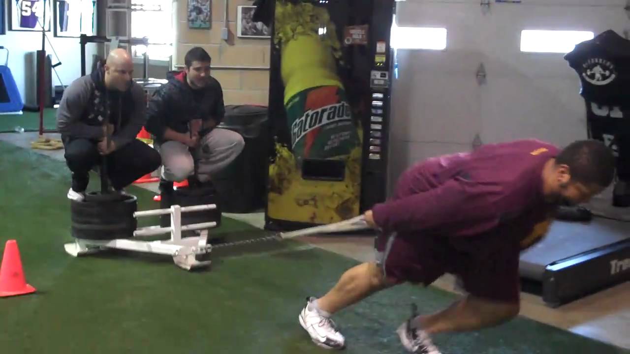 DeFrancosGym.com: Jeff Wills 1200lb. sled drag!!!
