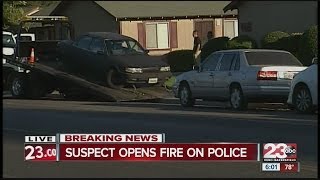 Suspect opens fire on police