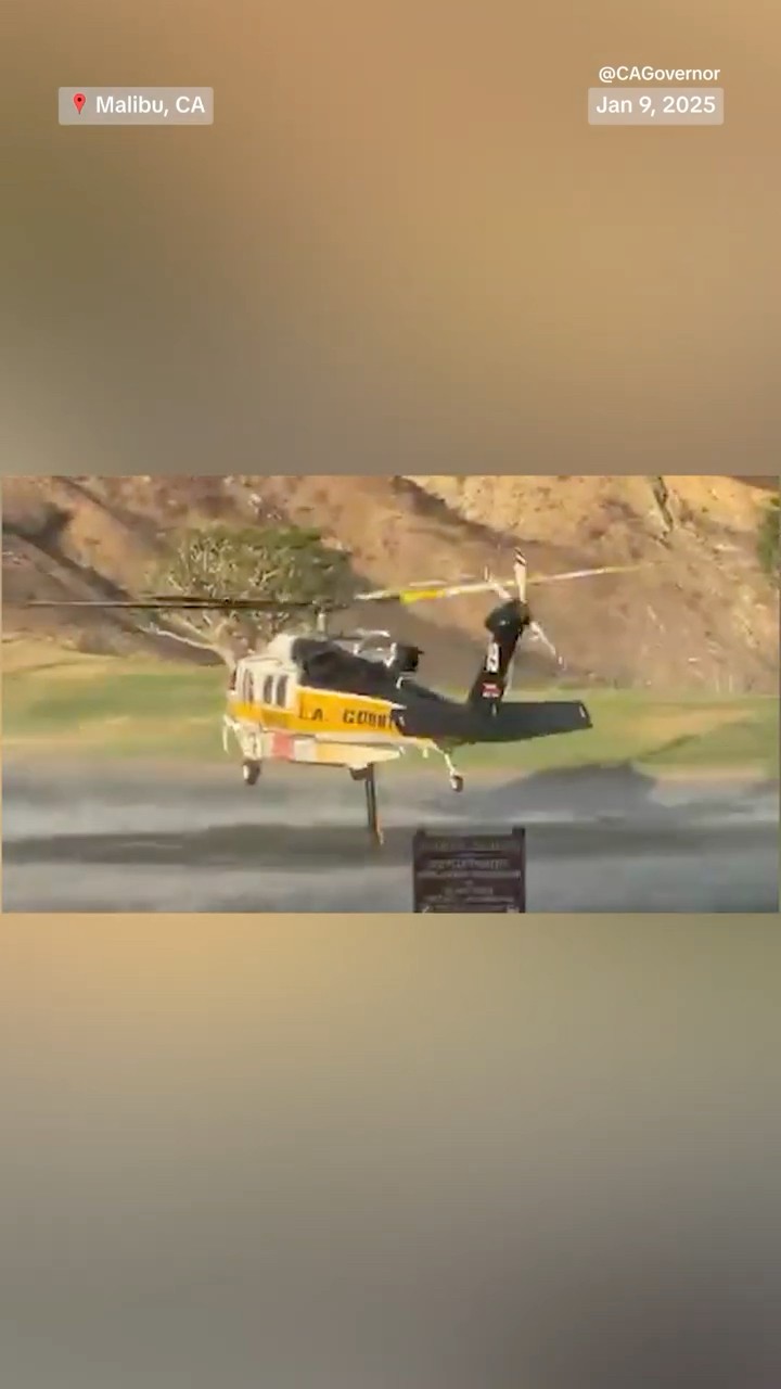 First responders use helicopter to transport water to fight L.A. fire