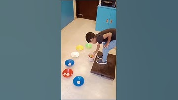 Vestibular Board Fun: Enhancing Motor Skills with Tong Transfer Activity #specialneeds #shortfeed