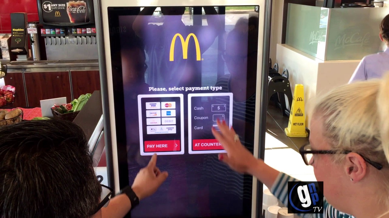 McDonald's debuts self-service kiosks - YouTube