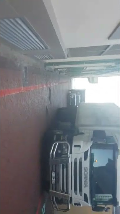 Whole row of rucks stuck behind too large vehicle