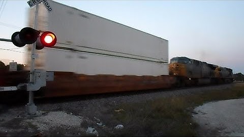 CSX Intermodal Container Train Through Town At Dusk