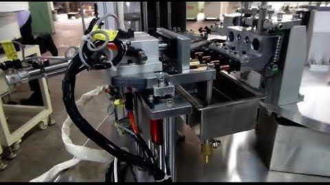 Automatic soldering & pin insertion machine. newwinhk@hotmail.com