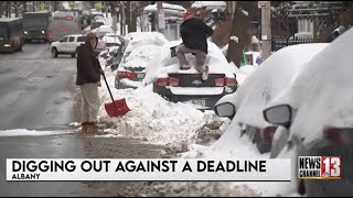 Albany residents racing to dig out cars ahead of the snow emergency