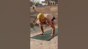 Advanced Yoga transition by the temple pond (the beanie is back)