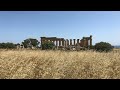 How did the Greeks and Romans build colossal temples?