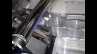 Flow wrapper packaging petri dishes