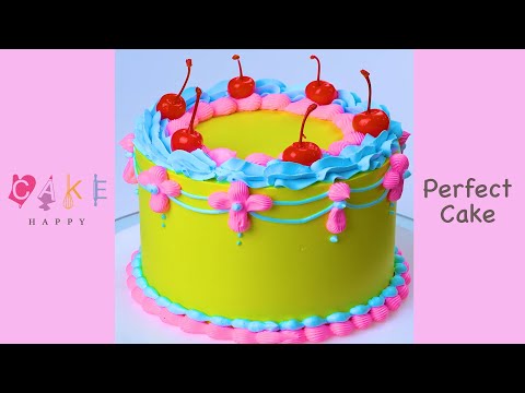 Yellow Birthday Cake Decorating With Cherry