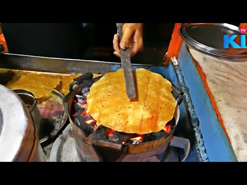 印度特色碳烤薄饼 在碳火上烤到冒泡膨化 还要不停的用手掰饼边！