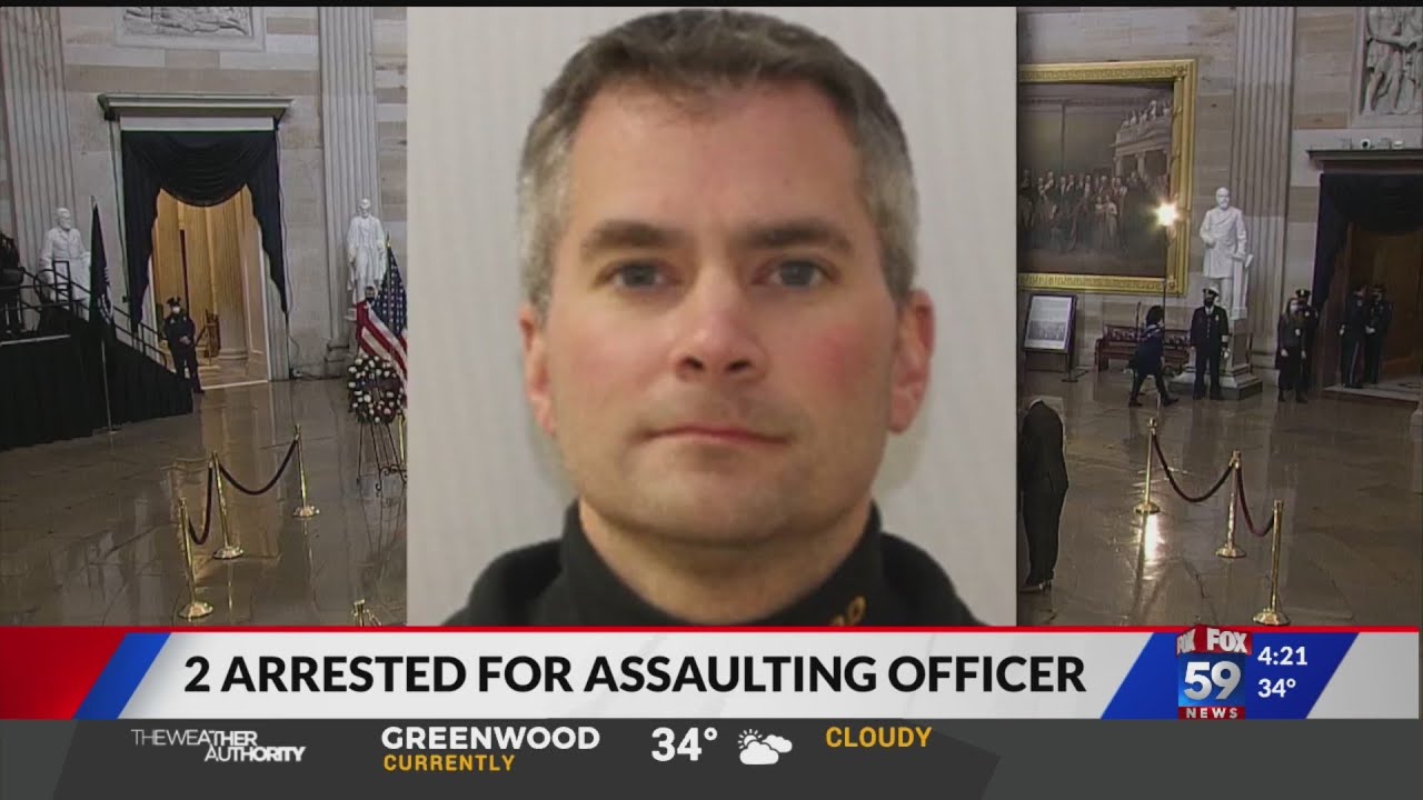 Two men charged in assaulting Capitol police officer during ...