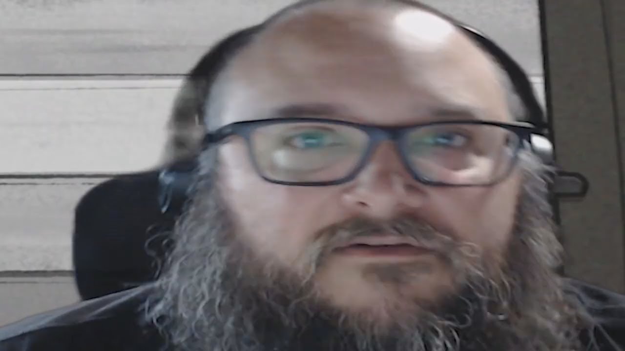 Edmund McMillen wishes you a good day while playing Mewgenics