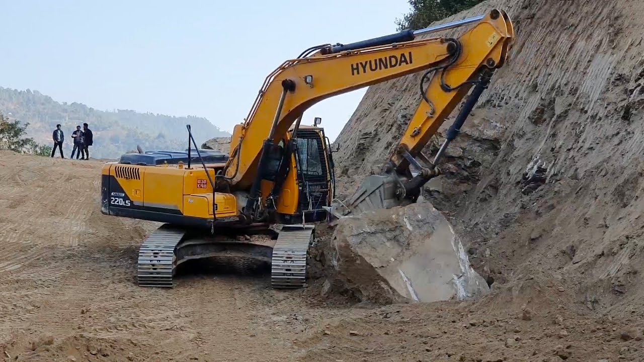 Hyundai And Kobelco 220 Excavator Cutting Hill And Opening New Track hyundai-and-kobelco-220-excavator-cutting-hill-and-opening-new-track