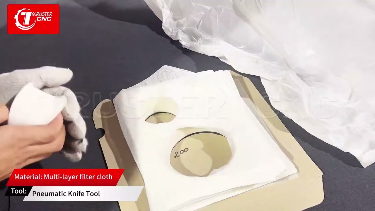 Multi-layer filter cloth cutting machine with pneumatic knife tool