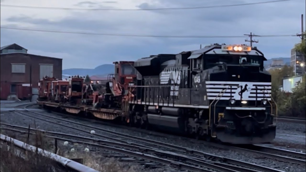 NS Company Maintenance of Way equipment train heads through Altoona