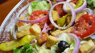 Here's What Really Makes Olive Garden's Salad So Delicious