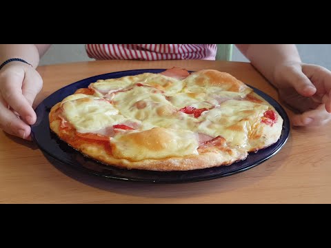 ელენე აცხობს უგემრიელეს პიცას.