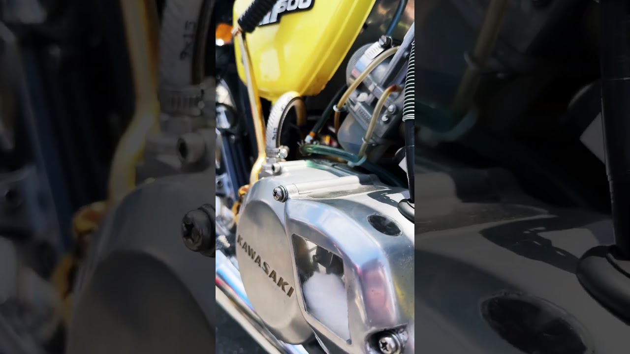 Do you know this bike? Its triple exhaust pipes and pastel-colored