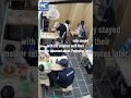 Police officers babysit while mother takes bathroom break