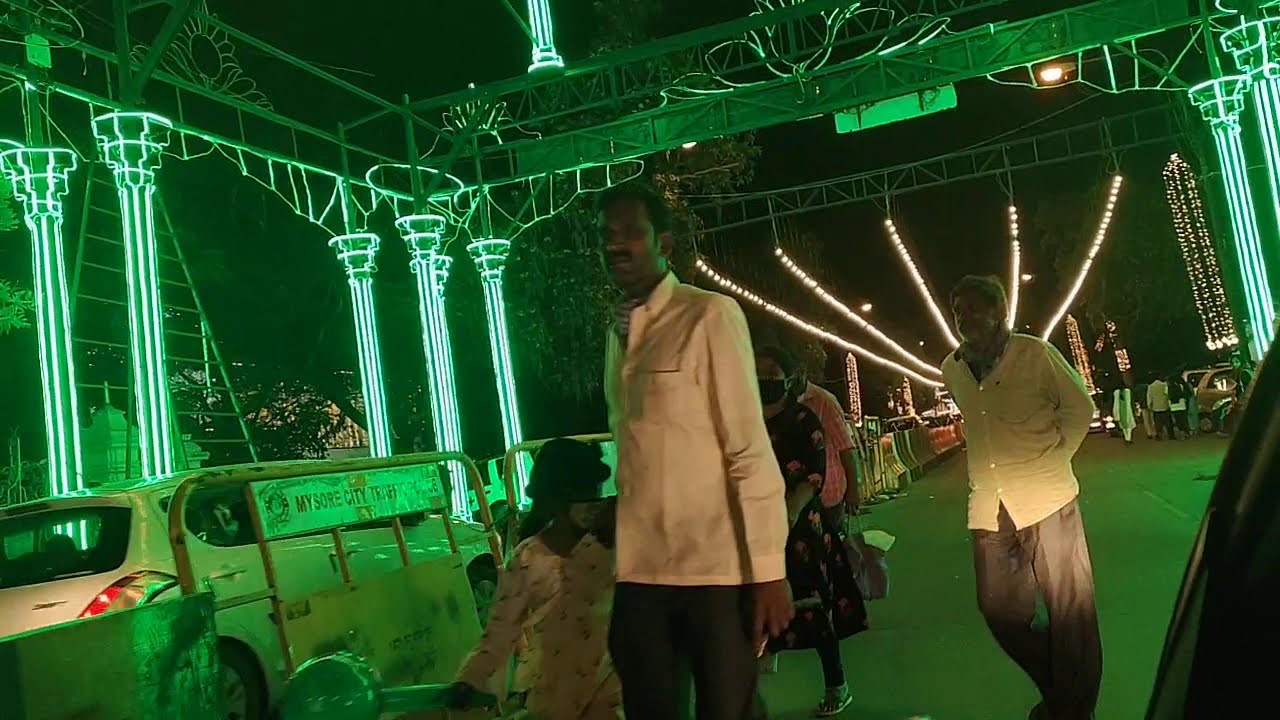 Mysore Palace and roads with colorful lights in Dasara