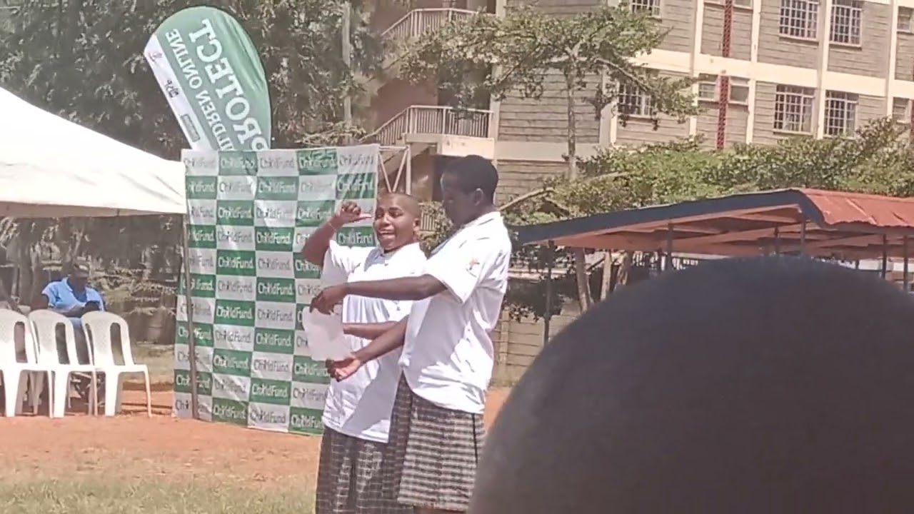 a poem in sign language Machakos school for the deaf.