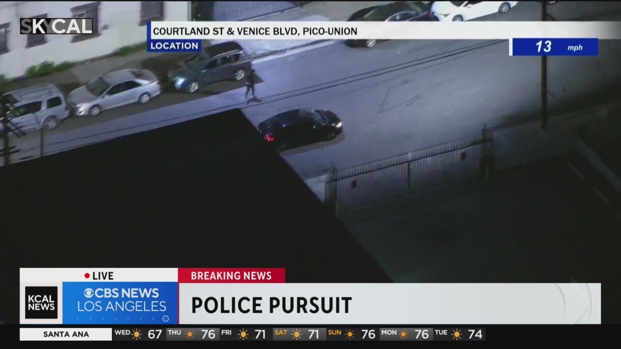 Another passenger jumps out of pursuit vehicle after spike strip