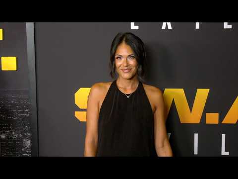 Jesiree Dizon on the black carpet at the "S.W.A.T. Exiles" premiere party