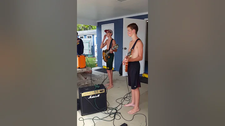 Tyler and Jack playing national anthem at swim mee...
