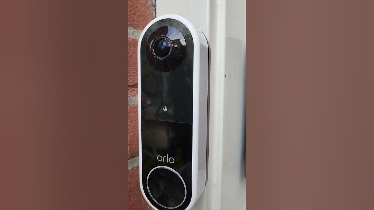 Removing the Arlo doorbell battery for charging . YouTube