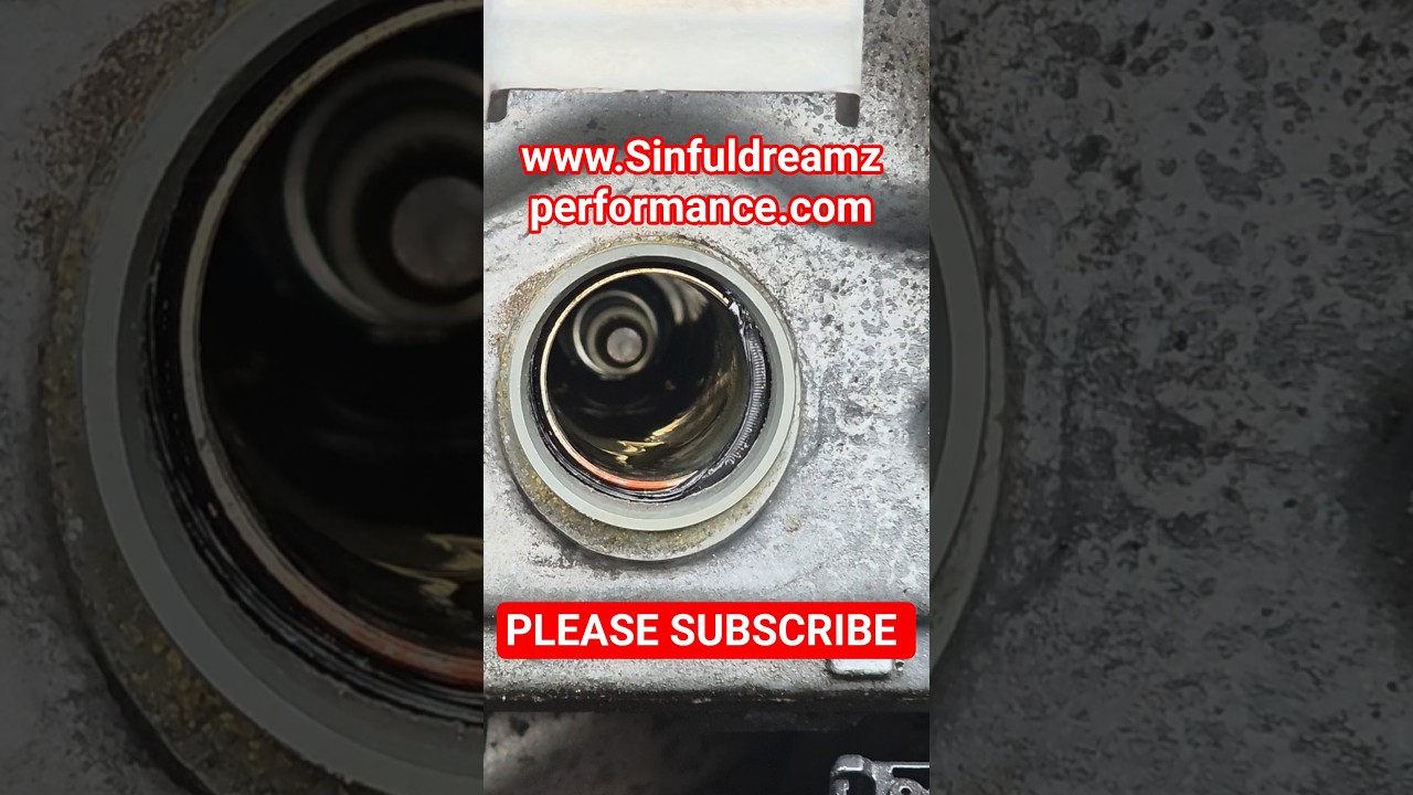 oil leaking into the spark plug chamber