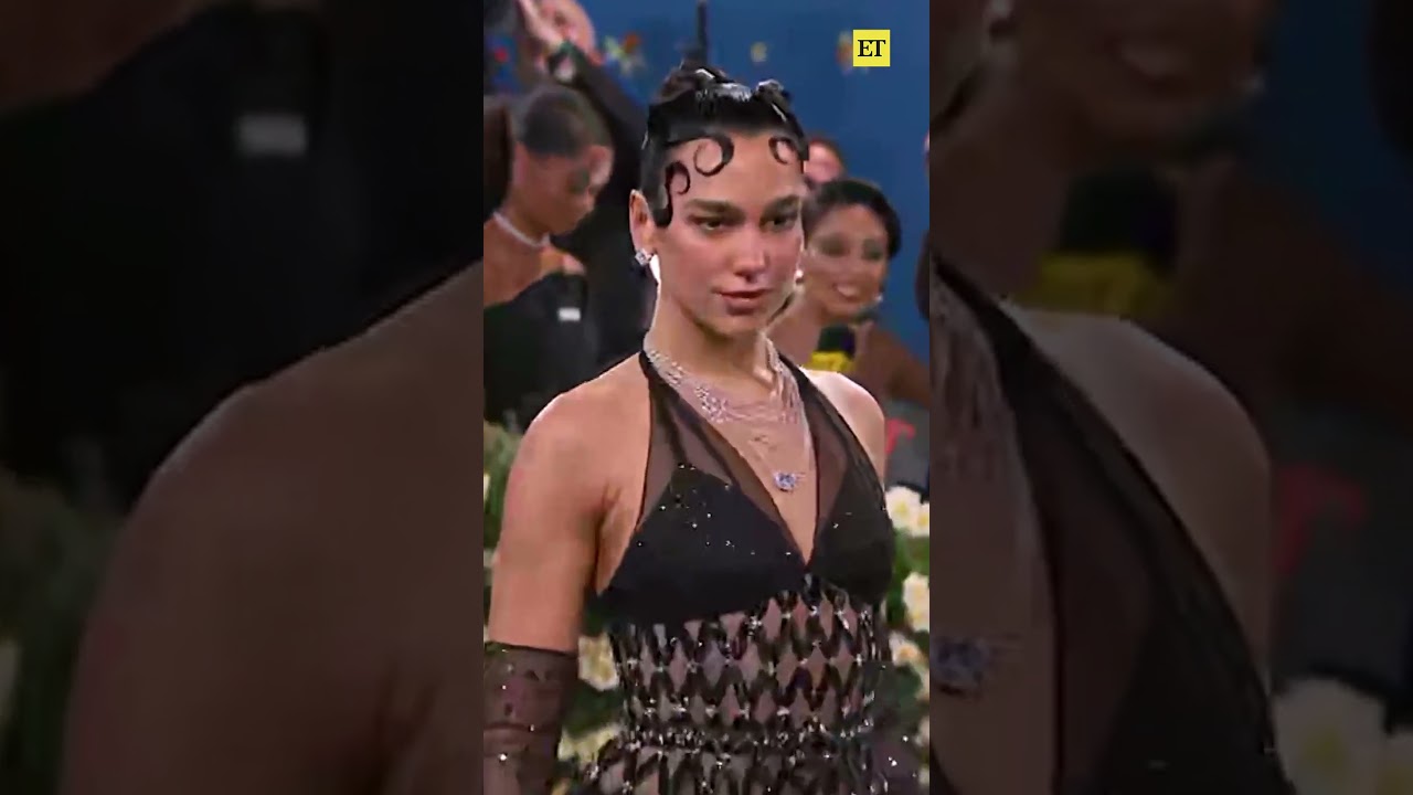 Dua Lipa and Callum Turner make their red carpet debut together at the 