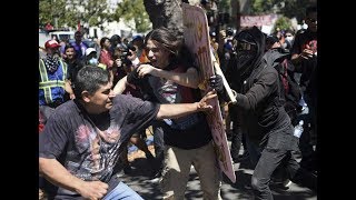 Black-clad antifa attack right-wing demonstrators in Berkeley