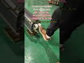 Workers are installing cantilever doors in the factory