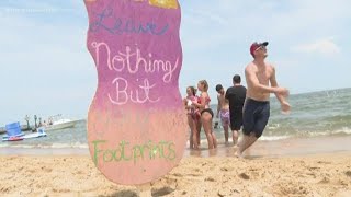 Norfolk police, waste management teams help keep beach clean at second floatopia event
