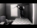 Jumping on the bed in slow mo