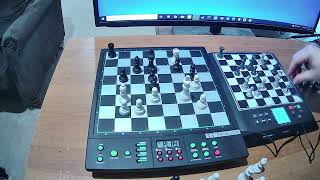 Millennium Chess Genius Pro vs Tabutronic Proelium