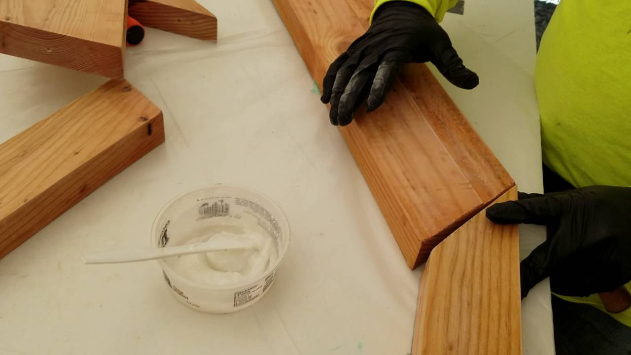 Preparing to glue together the first boat frame.
